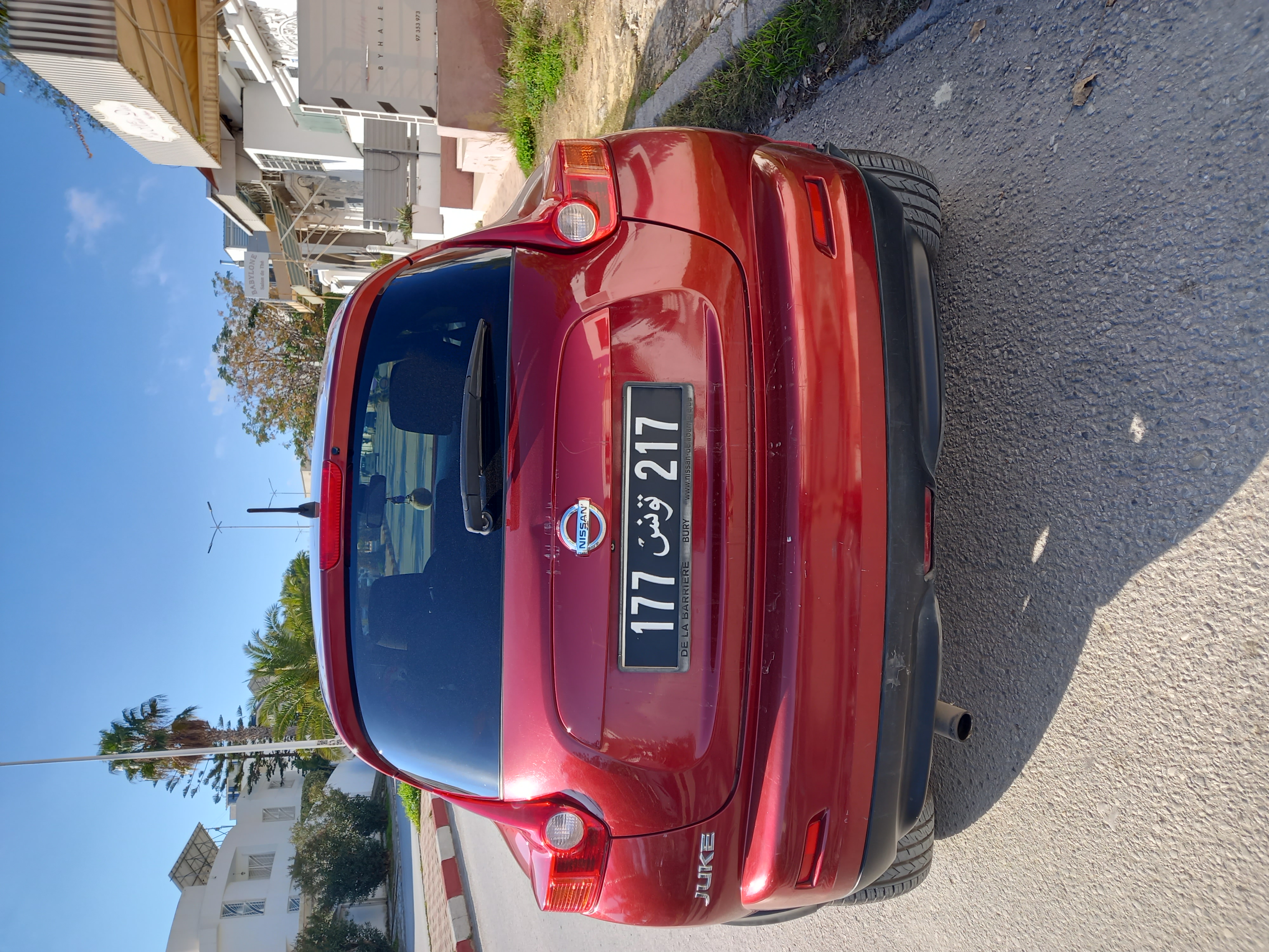 Ariana Ville Ariana Nissan JX-20 Nissan juke rouge bordeaux