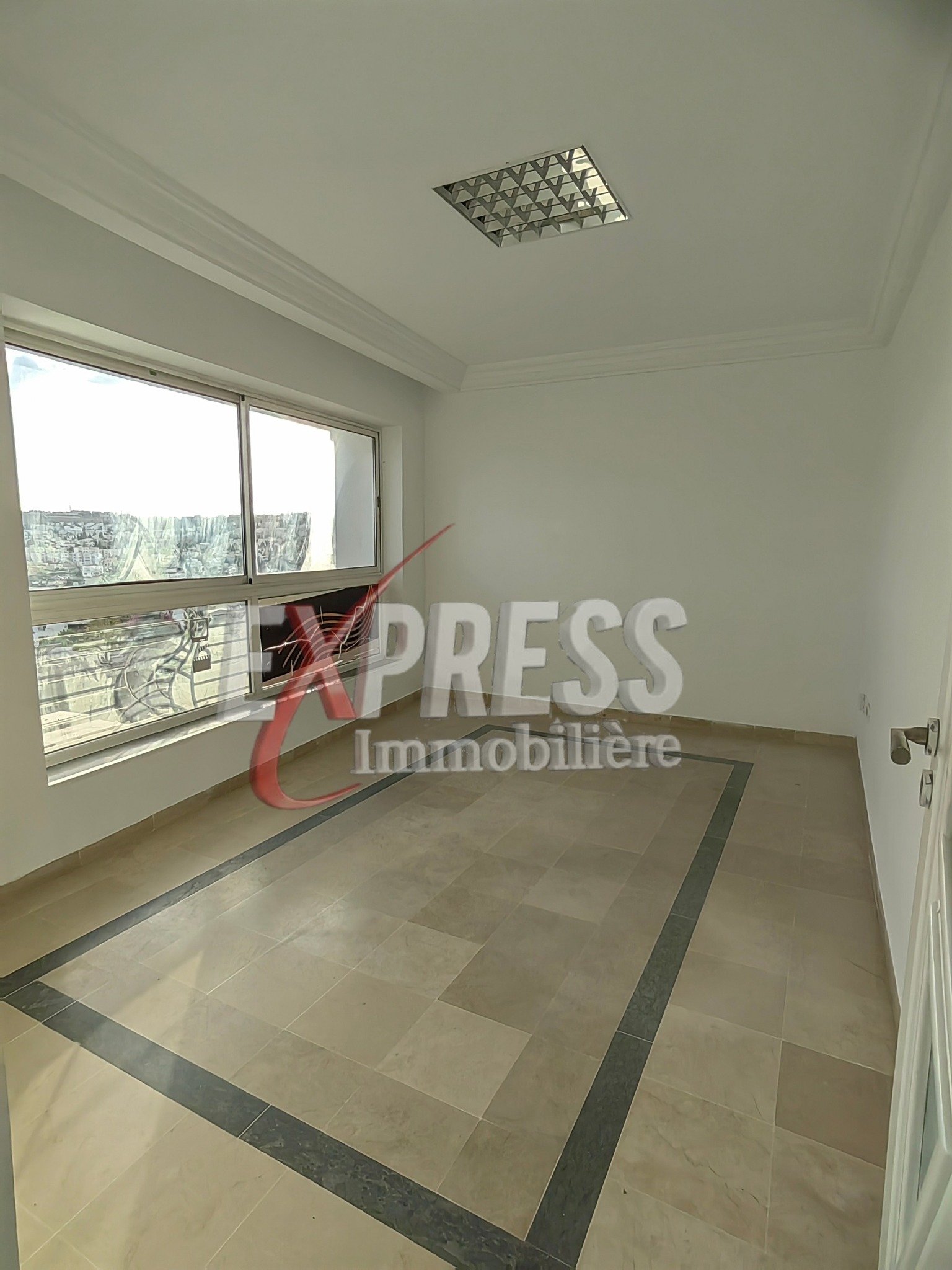 Ariana Ville Cite Ennasr 2 Location Surfaces Bureau h2 dams immeuble bureautique