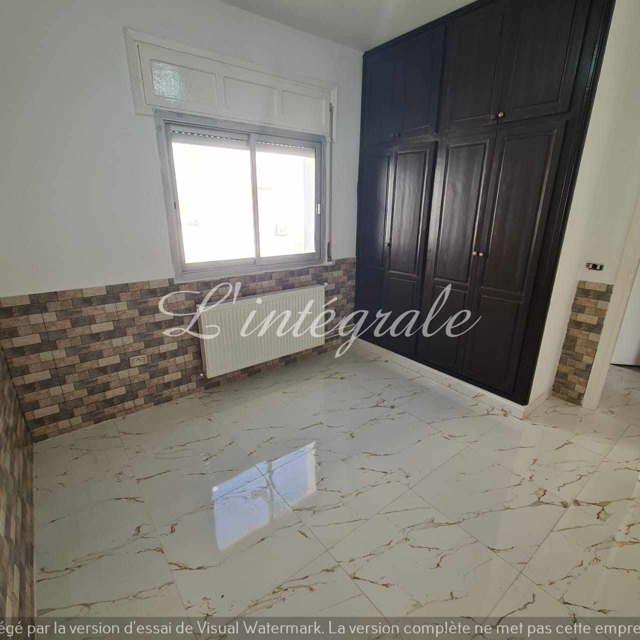 Ariana Ville&nbsp;Cite Ennasr 2&nbsp;Location&nbsp;Appart. 2 pi�ces&nbsp;S1 retap� enasser1